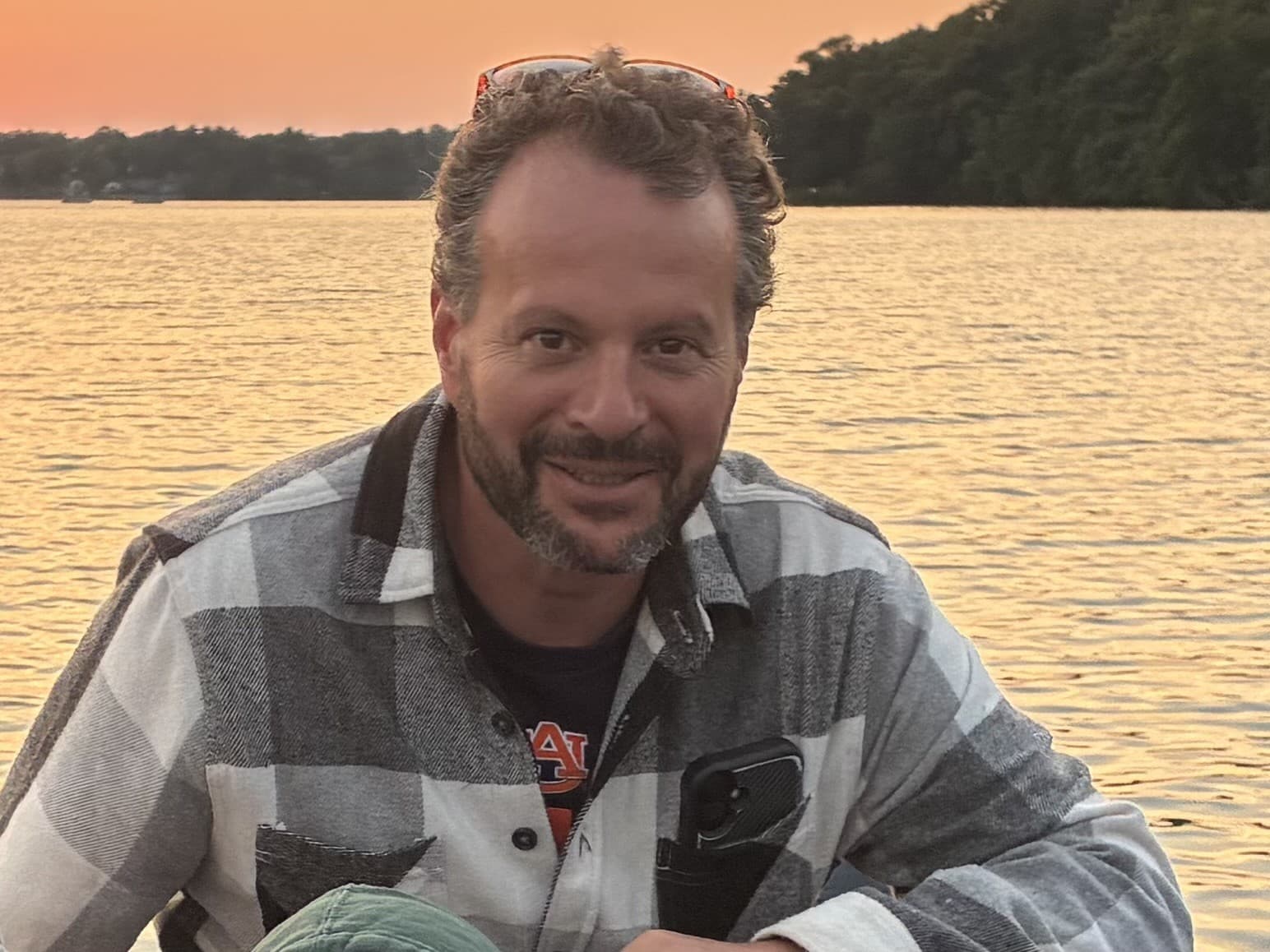 Jon Gergen on the lake at sunset